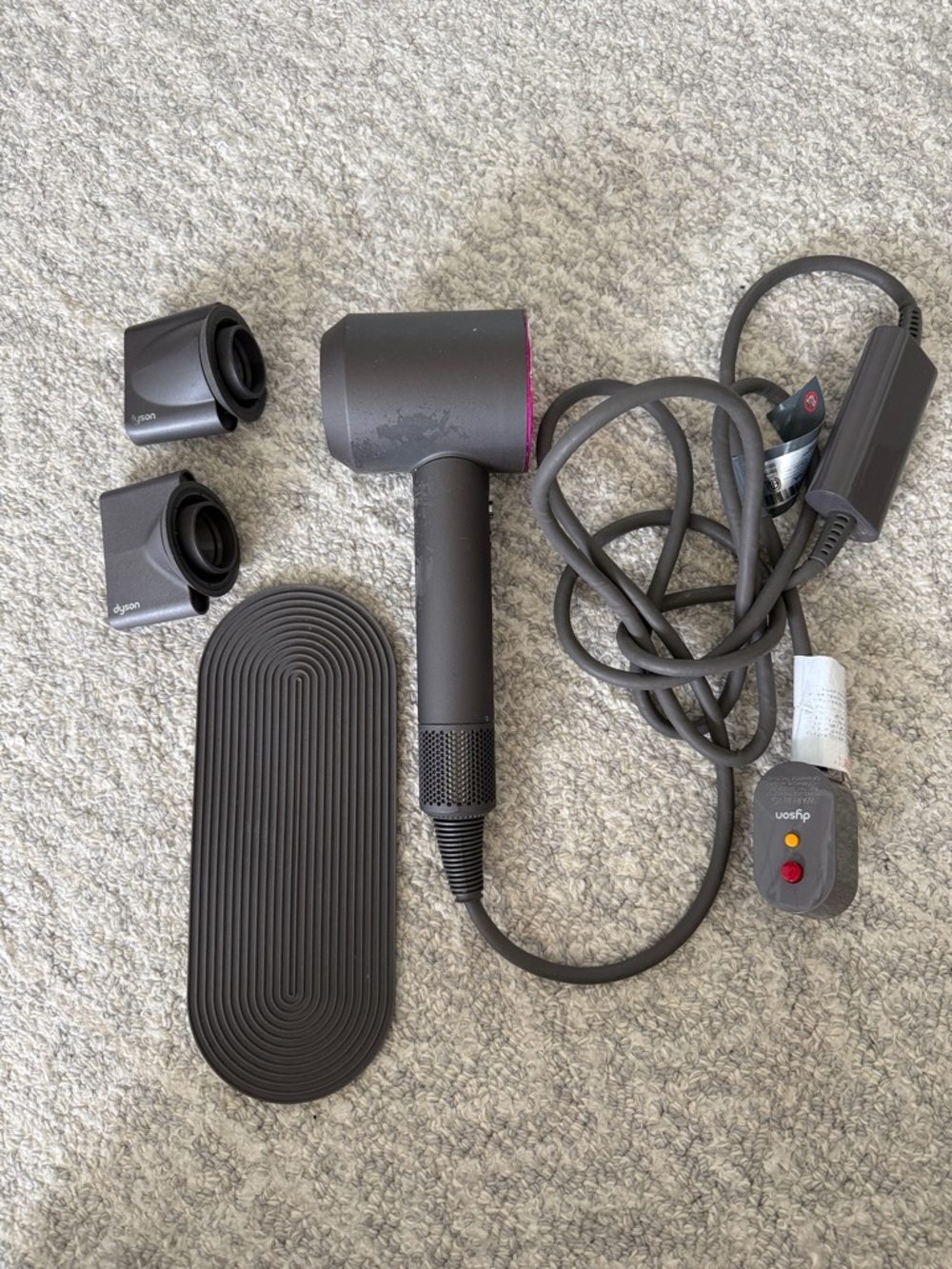 Dyson Hair Dryer in Charcoal with Pink Accent and Magnetic Nozzles